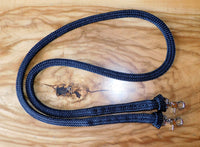 Pre made-Flat black small pony length reins.